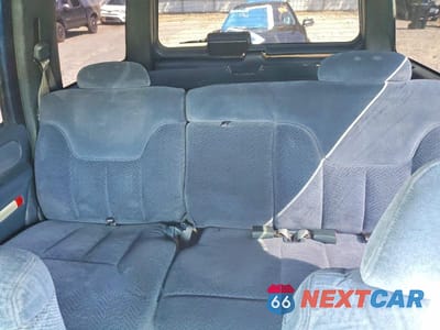 Zdjęcie 10 z 13 samochodu: 1995 CHEVROLET TAHOE C1500 VIN:1GNEC13K0SJ439140 - miniatura