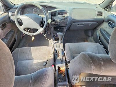 Zdjęcie 8 z 12 samochodu: 1994 TOYOTA COROLLA DX VIN:JT2AE09B1R0053645 - miniatura