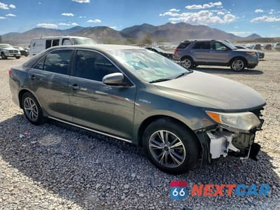 Czwarte zdjęcie samochodu z boku: 2012 TOYOTA CAMRY HYBRID LE VIN:4T1BD1FK5CU028977 - miniatura