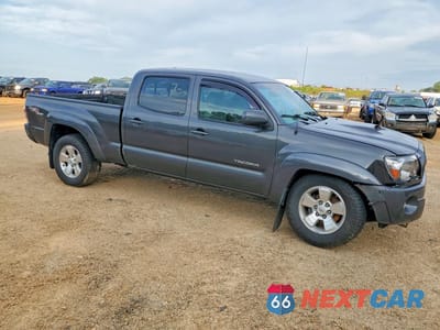Czwarte zdjęcie samochodu z boku: 2011 TOYOTA TACOMA DOUBLE CAB LONG BED VIN:3TMMU4FN8BM036003 - miniatura