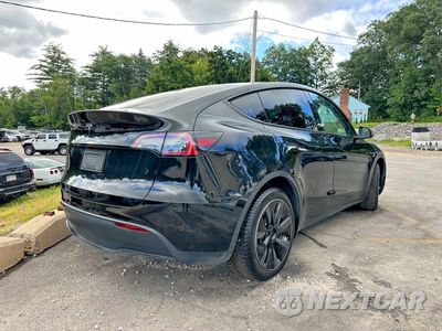 Trzecie zdjęcie samochodu z tyłu: 2024 TESLA MODEL Y VIN:7SAYGDEE4RA238488 - miniatura