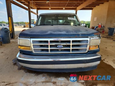 Piąte zdjęcie samochodu w środku: 1995 FORD F150 VIN:1FTEF15NXSLB58099 - miniatura
