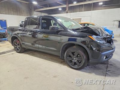 Czwarte zdjęcie samochodu z boku: 2017 HONDA RIDGELINE BLACK EDITION VIN:5FPYK3F80HB007238 - miniatura