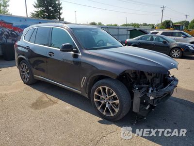 Czwarte zdjęcie samochodu z boku: 2022 BMW X5 XDRIVE40I VIN:5UXCR6C04N9N08801 - miniatura