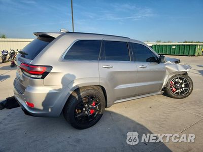 Trzecie zdjęcie samochodu z tyłu: 2015 JEEP GRAND CHEROKEE SRT-8 VIN:1C4RJFDJ4FC236068 - miniatura