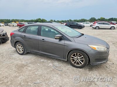 Czwarte zdjęcie samochodu z boku: 2016 FORD FOCUS SE VIN:1FADP3F28GL242752 - miniatura