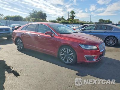 Czwarte zdjęcie samochodu z boku: 2017 LINCOLN MKZ HYBRID RESERVE VIN:3LN6L5MU6HR634996 - miniatura