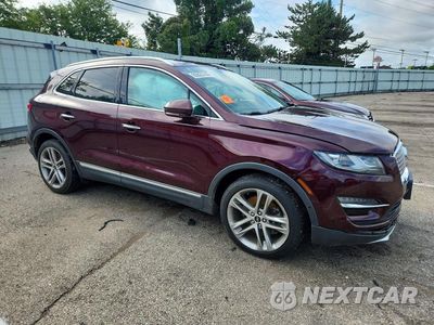 Czwarte zdjęcie samochodu z boku: 2019 LINCOLN MKC RESERVE VIN:5LMCJ3D97KUL03768 - miniatura