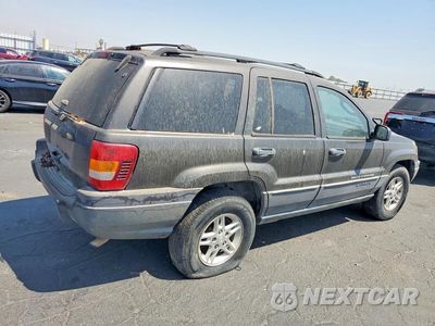 Trzecie zdjęcie samochodu z tyłu: 2004 JEEP GRAND CHEROKEE LAREDO VIN:1J4GW48SX4C400026 - miniatura