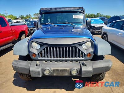 Piąte zdjęcie samochodu w środku: 2009 JEEP WRANGLER UNLIMITED X VIN:1J8GA39159L729558 - miniatura