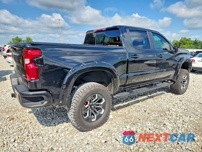 Trzecie zdjęcie samochodu z tyłu: 2020 CHEVROLET SILVERADO K1500 RST VIN:3GCUYEEL6LG305173 - miniatura