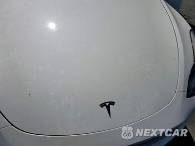 Zdjęcie 11 z 12 samochodu: 2023 TESLA MODEL Y VIN:7SAYGDEE9PF621925 - miniatura