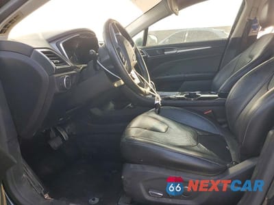 Zdjęcie 7 z 13 samochodu: 2014 FORD FUSION TITANIUM HEV VIN:3FA6P0RU1ER336619 - miniatura