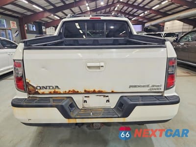 Zdjęcie 6 z 12 samochodu: 2014 HONDA RIDGELINE SPORT VIN:5FPYK1F77EB009706 - miniatura
