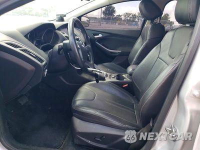 Zdjęcie 7 z 12 samochodu: 2014 FORD FOCUS TITANIUM VIN:1FADP3N27EL463404 - miniatura