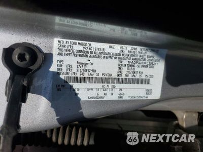 Zdjęcie 12 z 12 samochodu: 2015 FORD FOCUS TITANIUM VIN:1FADP3J23FL256211 - miniatura