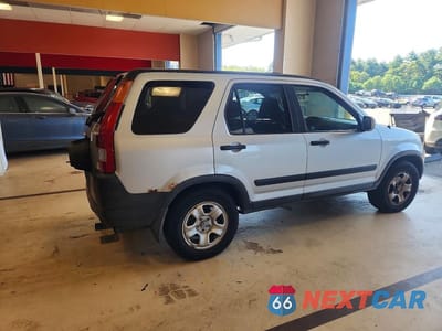 Trzecie zdjęcie samochodu z tyłu: 2004 HONDA CR-V EX VIN:SHSRD78864U220712 - miniatura
