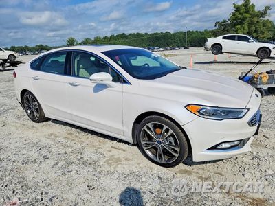 Czwarte zdjęcie samochodu z boku: 2017 FORD FUSION TITANIUM VIN:3FA6P0D95HR160231 - miniatura