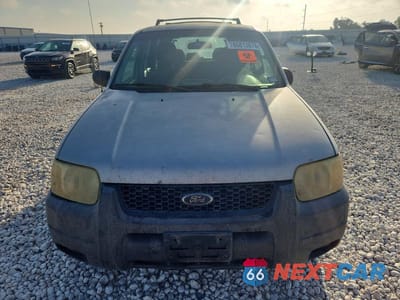 Piąte zdjęcie samochodu w środku: 2004 FORD ESCAPE XLS VIN:1FMYU02174KA16022 - miniatura