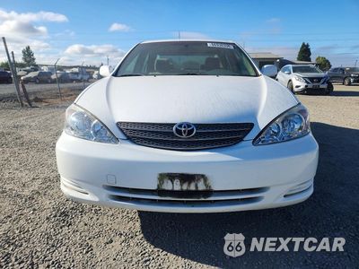 Piąte zdjęcie samochodu w środku: 2003 TOYOTA CAMRY LE VIN:JTDBE32K430170117 - miniatura