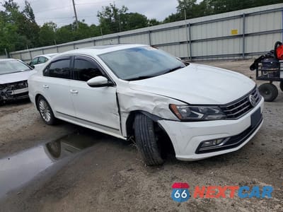 Czwarte zdjęcie samochodu z boku: 2016 VOLKSWAGEN PASSAT SE VIN:1VWBT7A37GC068349 - miniatura