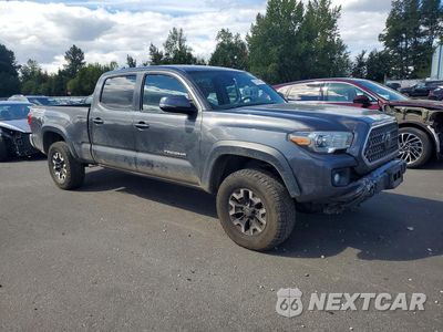 Czwarte zdjęcie samochodu z boku: 2019 TOYOTA TACOMA TRD OFF-ROAD VIN:3TMDZ5BN7KM065084 - miniatura