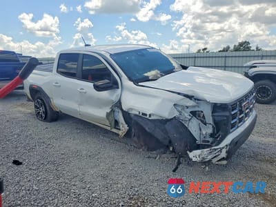 Czwarte zdjęcie samochodu z boku: 2024 GMC CANYON AT4 VIN:1GTP6DEKXR1320058 - miniatura