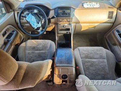 Zdjęcie 8 z 14 samochodu: 2004 HONDA PILOT EX VIN:2HKYF18454H614677 - miniatura