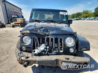 Piąte zdjęcie samochodu w środku: 2016 JEEP WRANGLER UNLIMITED SAHARA VIN:1C4BJWEGXGL239126 - miniatura