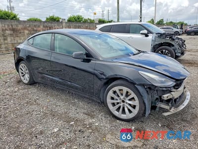Czwarte zdjęcie samochodu z boku: 2020 TESLA MODEL 3 VIN:5YJ3E1EA1PF460446 - miniatura
