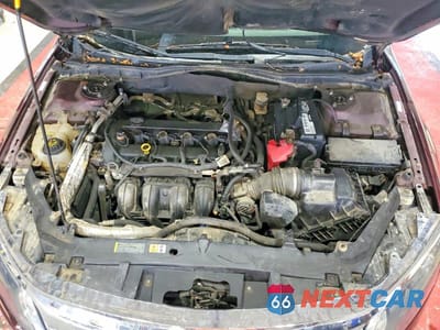 Zdjęcie 11 z 12 samochodu: 2012 FORD FUSION S VIN:3FAHP0GA2CR347708 - miniatura