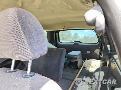 Zdjęcie 10 z 13 samochodu: 2000 JEEP GRAND CHEROKEE LAREDO VIN:1J4GW48S4YC409567 - miniatura