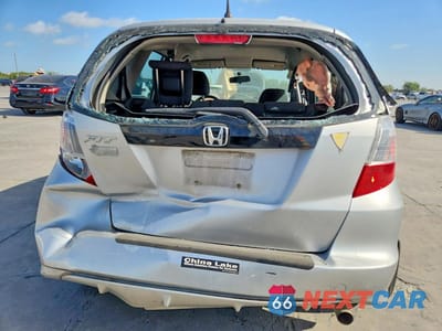 Zdjęcie 6 z 13 samochodu: 2012 HONDA FIT VIN:JHMGE8H3XCC040813 - miniatura