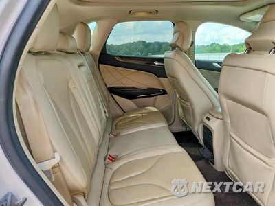 Zdjęcie 11 z 13 samochodu: 2017 LINCOLN MKC RESERVE VIN:5LMCJ3C93HUL01977 - miniatura