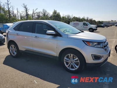 Czwarte zdjęcie samochodu z boku: 2015 FORD EDGE SEL VIN:2FMTK4J9XFBC36475 - miniatura