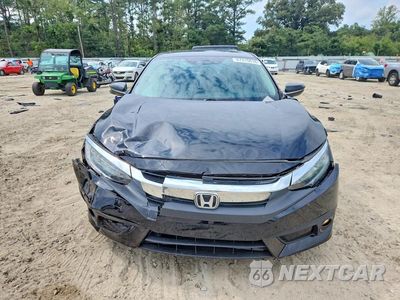 Piąte zdjęcie samochodu w środku: 2016 HONDA CIVIC TOURING VIN:19XFC1F90GE036656 - miniatura