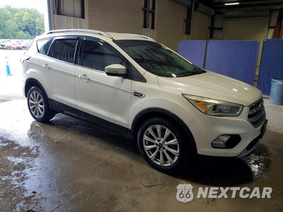 Czwarte zdjęcie samochodu z boku: 2017 FORD ESCAPE TITANIUM VIN:1FMCU0J95HUD06934 - miniatura