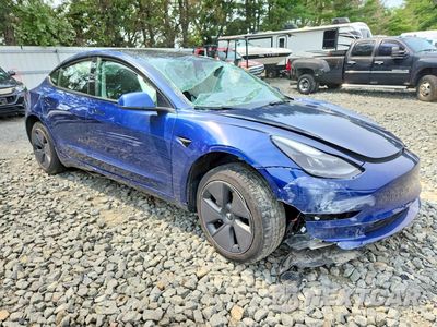 Czwarte zdjęcie samochodu z boku: 2023 TESLA MODEL 3 VIN:5YJ3E1EA3PF567126 - miniatura