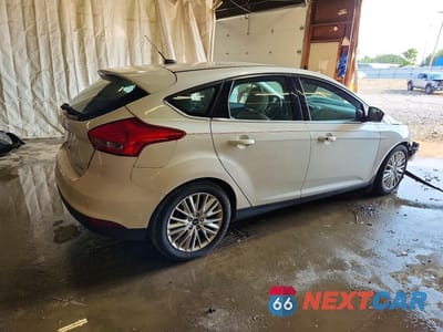 Trzecie zdjęcie samochodu z tyłu: 2018 FORD FOCUS TITANIUM VIN:1FADP3N24JL314426 - miniatura