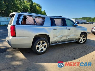 Trzecie zdjęcie samochodu z tyłu: 2017 CHEVROLET SUBURBAN K1500 PREMIER VIN:1GNSKJKC1HR218303 - miniatura