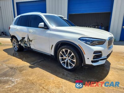 Czwarte zdjęcie samochodu z boku: 2022 BMW X5 XDRIVE40I VIN:5UXCR6C01N9M61713 - miniatura