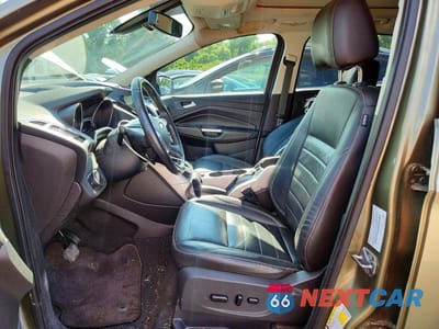 Zdjęcie 7 z 13 samochodu: 2013 FORD ESCAPE SEL VIN:1FMCU9HX1DUD46706 - miniatura