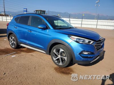 Czwarte zdjęcie samochodu z boku: 2017 HYUNDAI TUCSON LIMITED VIN:KM8J3CA25HU531322 - miniatura