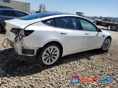 Trzecie zdjęcie samochodu z tyłu: 2023 TESLA MODEL 3 VIN:5YJ3E1EA1PF460463 - miniatura
