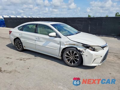 Czwarte zdjęcie samochodu z boku: 2016 TOYOTA AVALON XLE PREMIUM VIN:4T1BK1EB8GU208337 - miniatura
