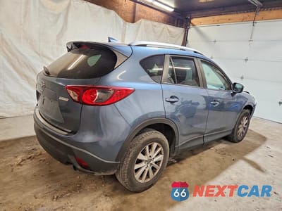 Trzecie zdjęcie samochodu z tyłu: 2016 MAZDA CX-5 TOURING VIN:JM3KE4CY9G0608197 - miniatura
