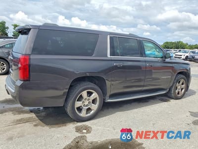 Trzecie zdjęcie samochodu z tyłu: 2017 CHEVROLET SUBURBAN K1500 PREMIER VIN:1GNSKJKC9HR149313 - miniatura