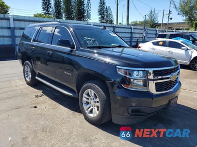 Czwarte zdjęcie samochodu z boku: 2020 CHEVROLET TAHOE K1500 LT VIN:1GNSKBKC0LR111239 - miniatura