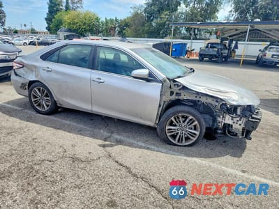 Czwarte zdjęcie samochodu z boku: 2017 TOYOTA CAMRY HYBRID SE VIN:4T1BD1FK5HU212260 - miniatura