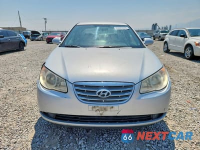 Piąte zdjęcie samochodu w środku: 2010 HYUNDAI ELANTRA BLUE VIN:KMHDU4AD0AU831552 - miniatura